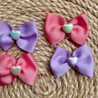 Lacinhos coração 💓- 10 unidades ( variados rosa e lilás )
